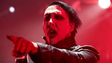 FILE - In this Aug. 2, 2015, file photo, Marilyn Manson performs in concert in Camden, N.J. Detectives are investigating Manson for allegations of domestic violence that reportedly occurred about a decade ago in West Hollywood, authorities said. The domestic violence is believed to have occurred between 2009 and 2011, when Manson lived in the city of West Hollywood. (Photo by Owen Sweeney/Invision/AP, File)